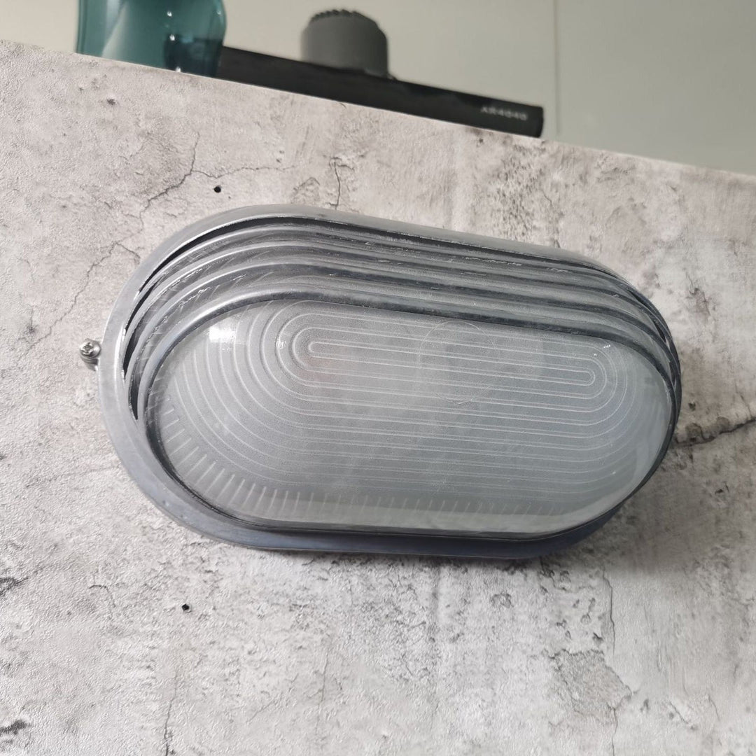 Contemporary Industrial Waterproof Aluminum Glass Frosted Oval Striped 1-Light Wall Sconce Lamp For Outdoor Patio | Bowlift