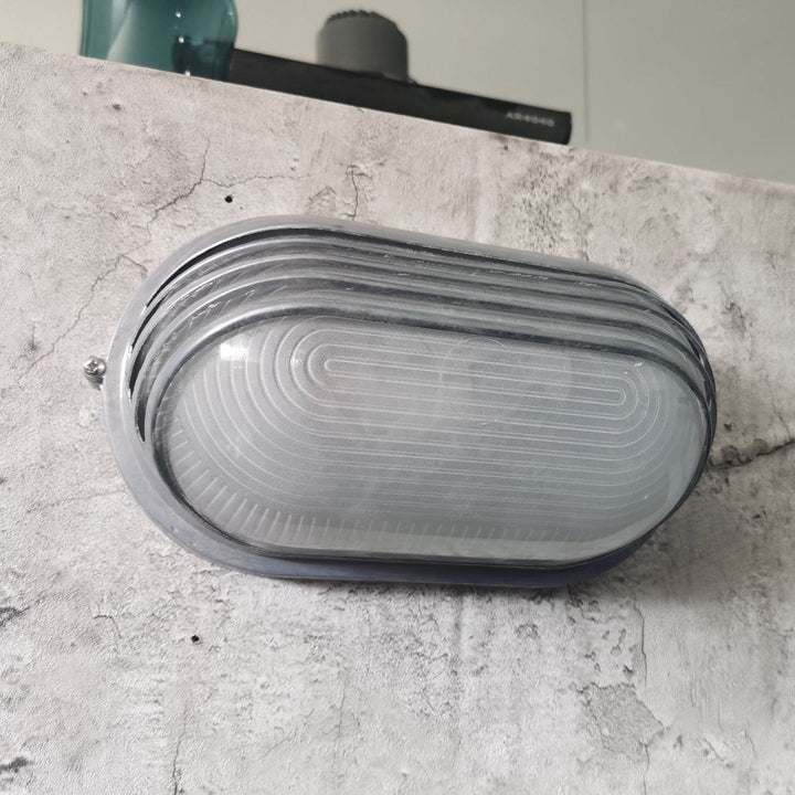 Contemporary Industrial Waterproof Aluminum Glass Frosted Oval Striped 1-Light Wall Sconce Lamp For Outdoor Patio | Bowlift