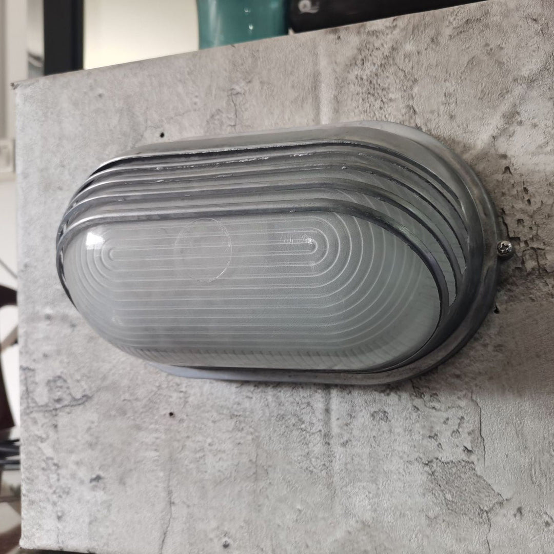 Contemporary Industrial Waterproof Aluminum Glass Frosted Oval Striped 1-Light Wall Sconce Lamp For Outdoor Patio | Bowlift