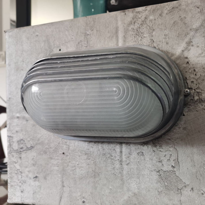 Contemporary Industrial Waterproof Aluminum Glass Frosted Oval Striped 1-Light Wall Sconce Lamp For Outdoor Patio | Bowlift