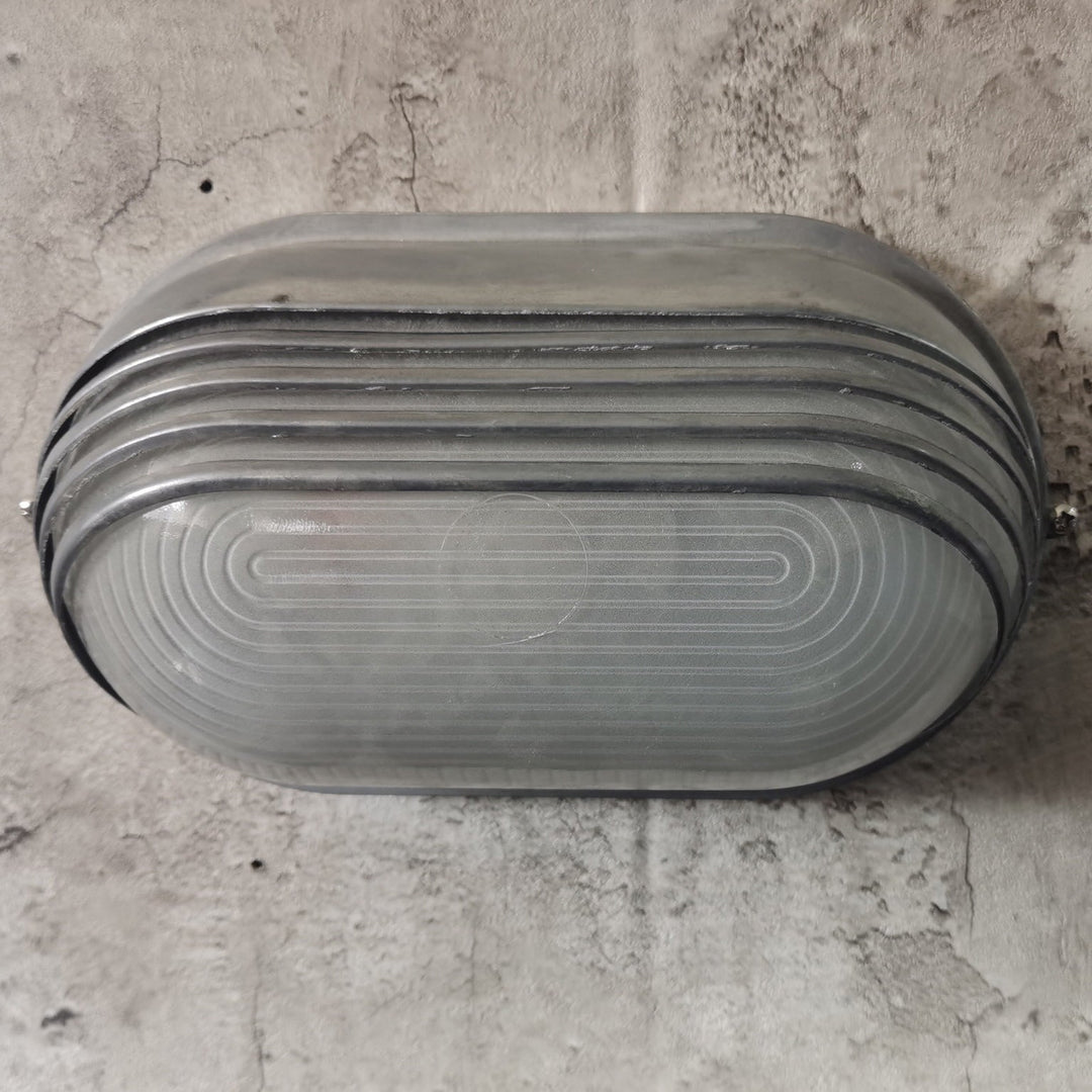 Contemporary Industrial Waterproof Aluminum Glass Frosted Oval Striped 1-Light Wall Sconce Lamp For Outdoor Patio | Bowlift