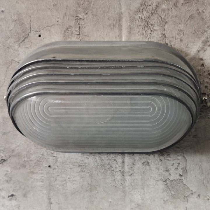 Contemporary Industrial Waterproof Aluminum Glass Frosted Oval Striped 1-Light Wall Sconce Lamp For Outdoor Patio | Bowlift