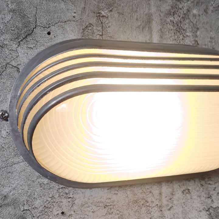 Contemporary Industrial Waterproof Aluminum Glass Frosted Oval Striped 1-Light Wall Sconce Lamp For Outdoor Patio | Bowlift