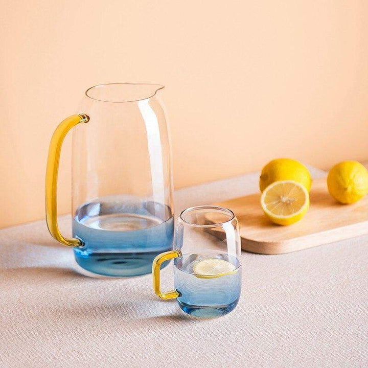 Blue glass pitcher with matching drinking glass Bowlift