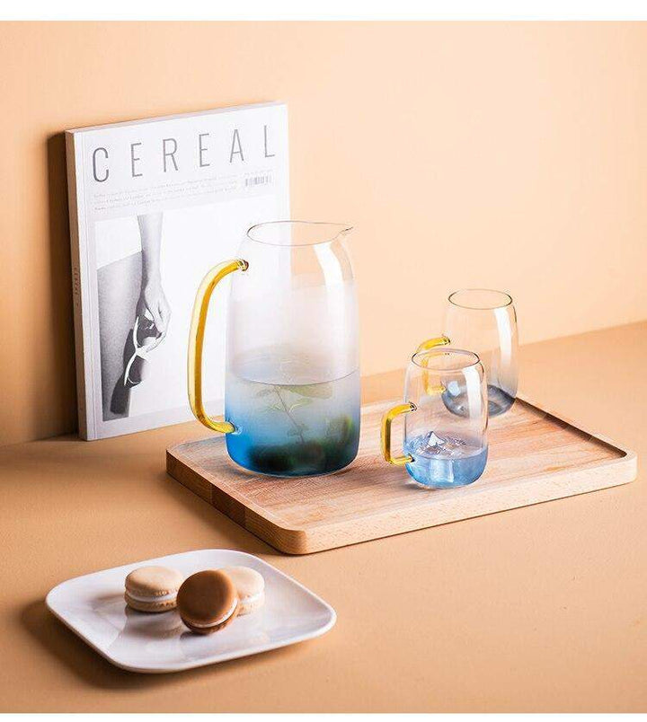 Blue glass pitcher with matching drinking glass Bowlift