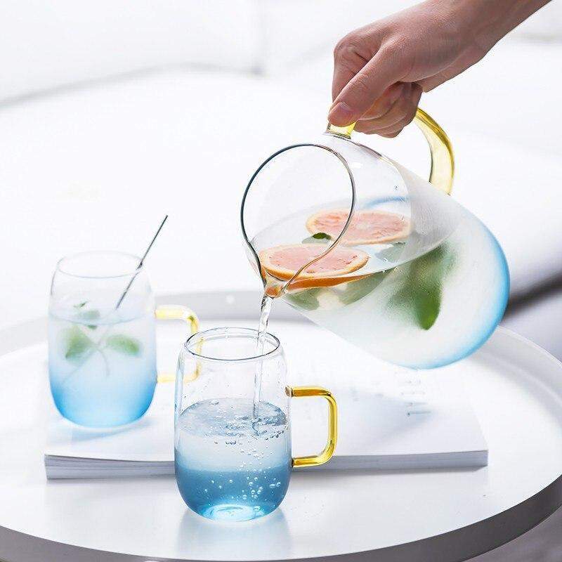 Blue glass pitcher with matching drinking glass Bowlift