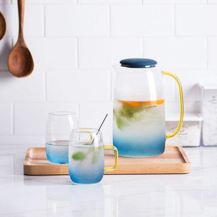 Blue glass pitcher with matching drinking glass Bowlift