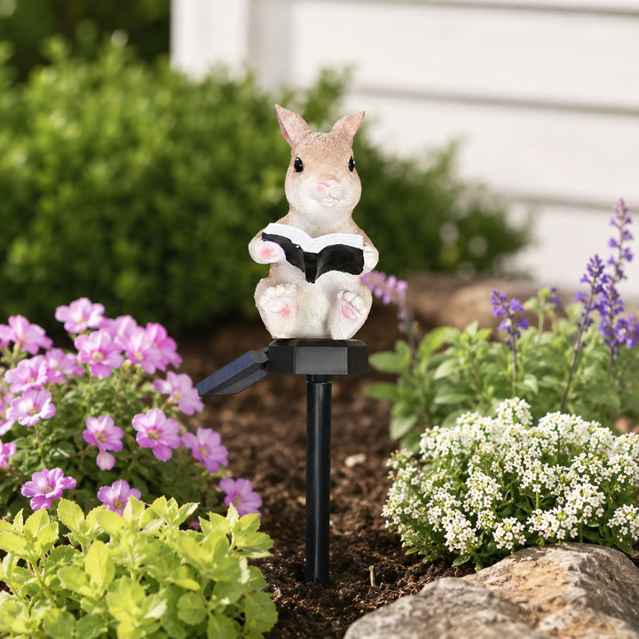 Decorative solar garden stake light with resin reading rabbit figurine topper Bowlift