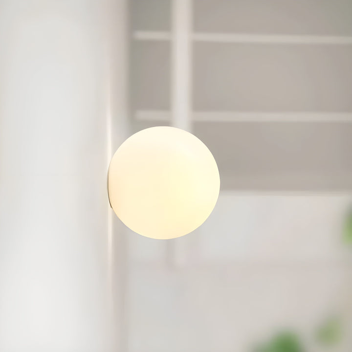 GlasAura Wall Lamp with Matte Glass Ball and Metal Base | Bowlift