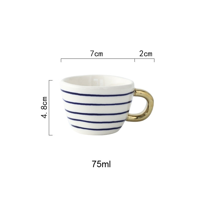 BowLift | Cup with abstract geometric pattern and gold handle