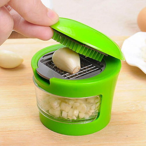 GarlicPress Pro - Compact Garlic Press with Reservoir Bowlift