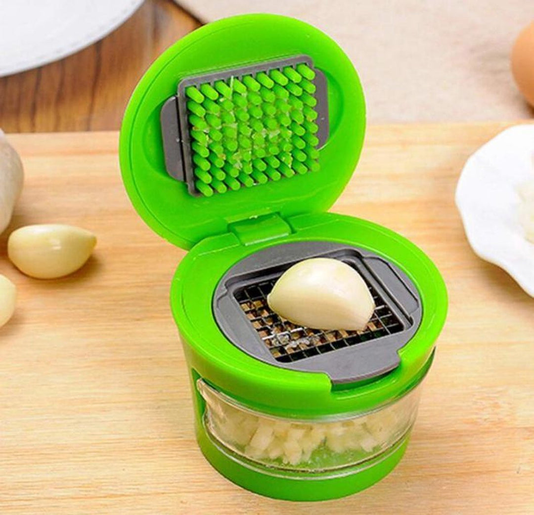 GarlicPress Pro - Compact Garlic Press with Reservoir Bowlift