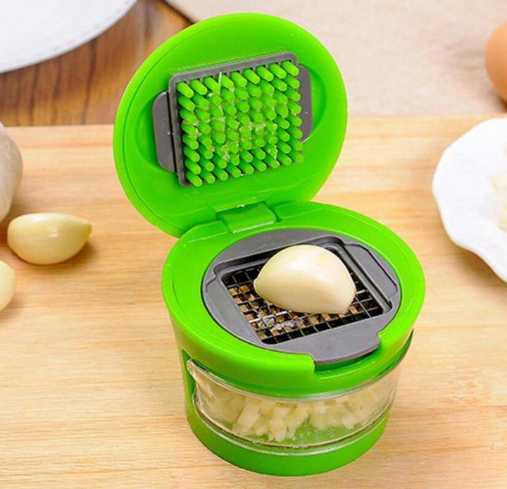 GarlicPress Pro - Compact Garlic Press with Reservoir Bowlift