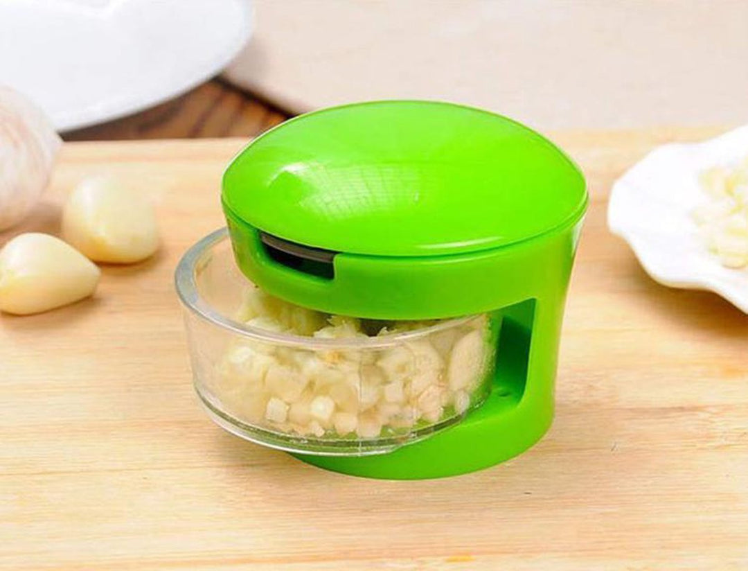 GarlicPress Pro - Compact Garlic Press with Reservoir Bowlift