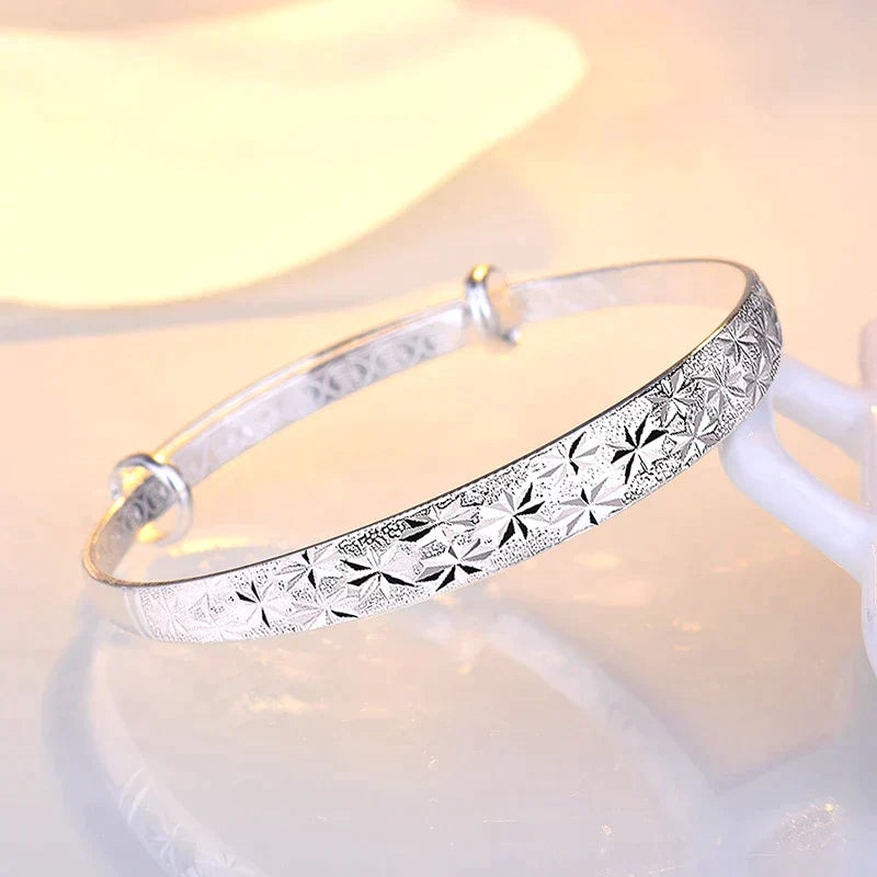 Enchanting Star-Shaped Silver Bracelet for a Radiant Look Bowlift