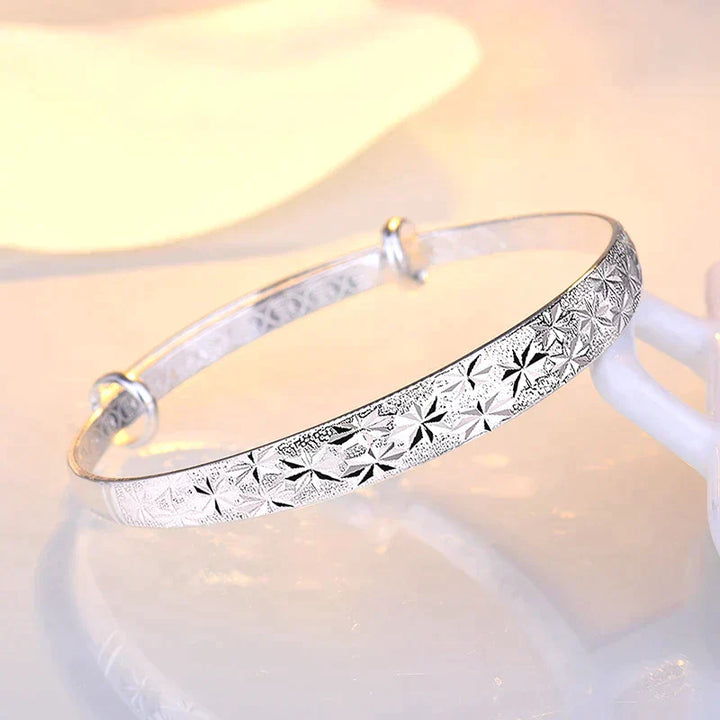 Enchanting Star-Shaped Silver Bracelet for a Radiant Look Bowlift