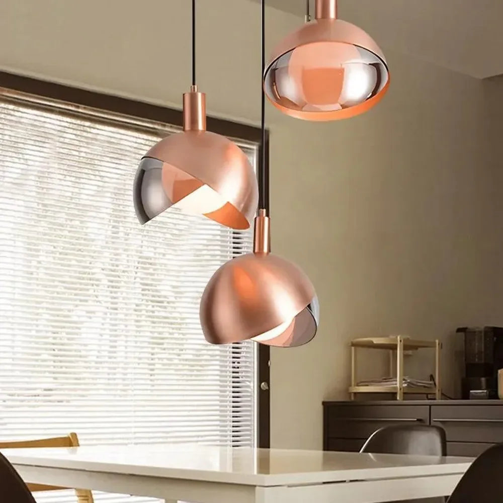 Modern golden pendant lights for dining room and kitchen, elegant design with ball lights | Bowlift