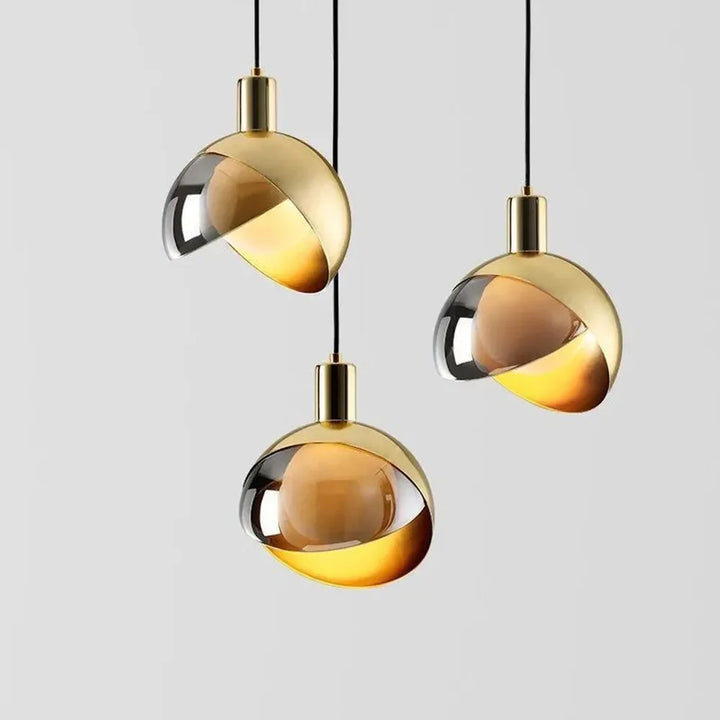 Modern golden pendant lights for dining room and kitchen, elegant design with ball lights | Bowlift