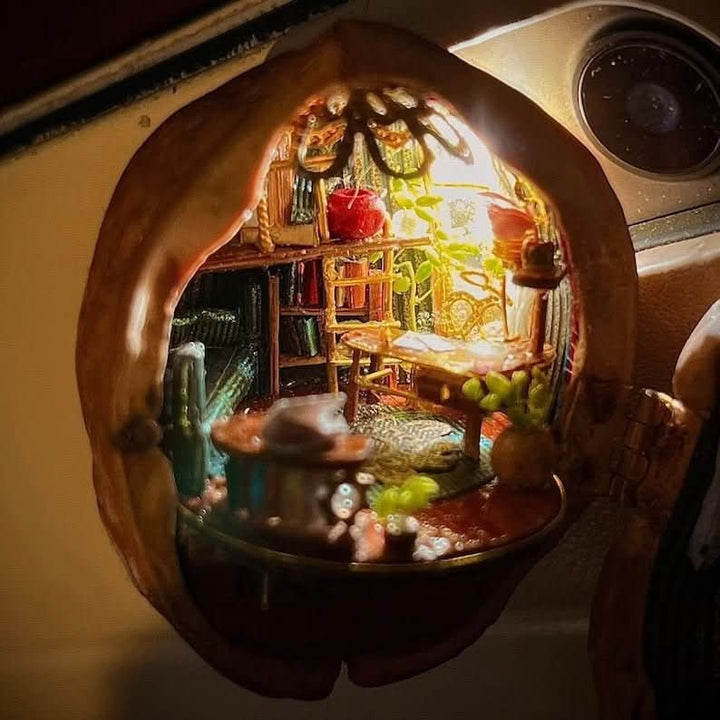 BowLift | Handmade dollhouse made from walnut shells with interior lighting