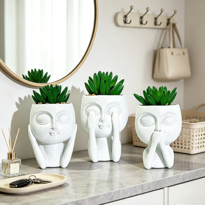 Plant pot with face motif Bowlift