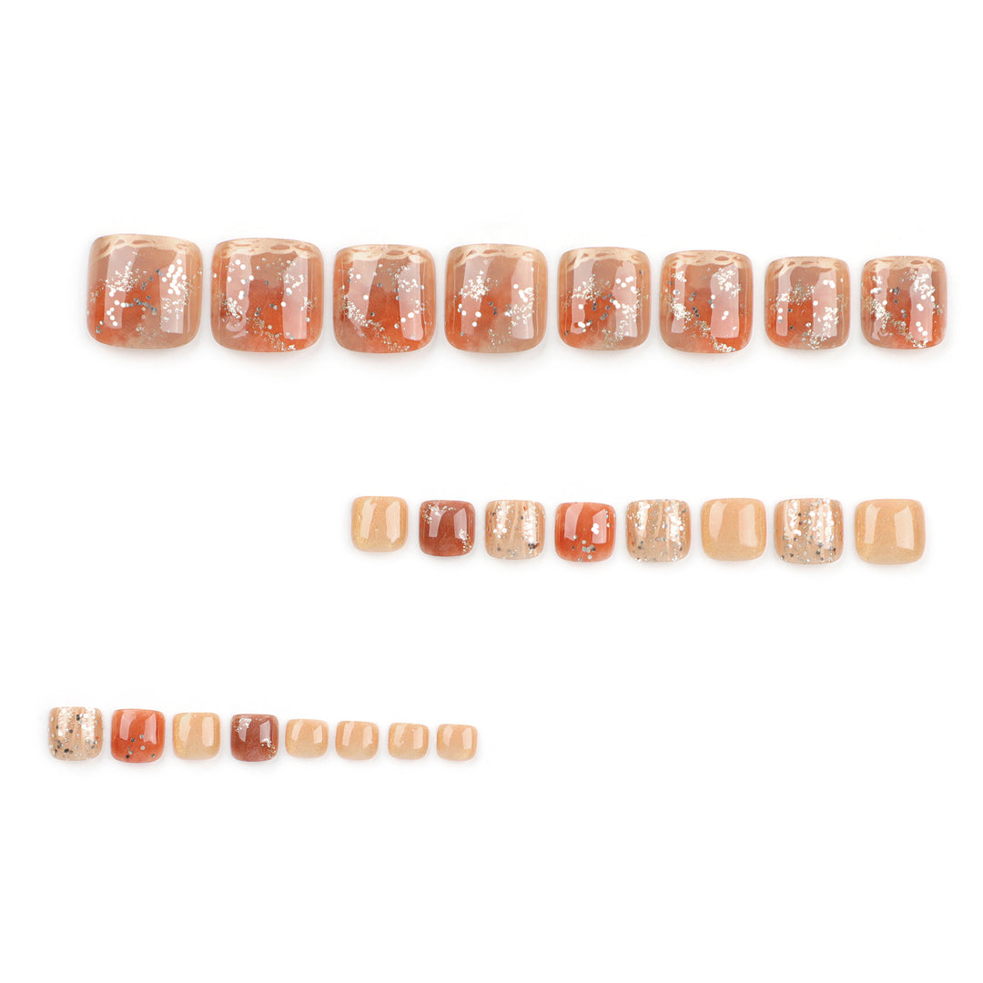 Artistic toenail design with glitter and golden accents Bowlift