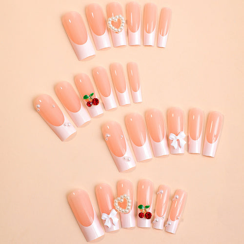 Artificial nail set with elegant 3D decorations and pearl accents Bowlift