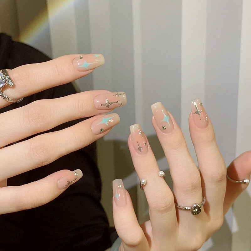 Acrylic nail set with sparkling star and glitter elements Bowlift