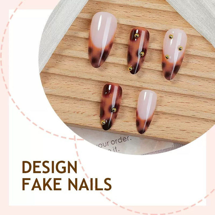 Acrylic nail set with luxurious leopard pattern and golden accents Bowlift