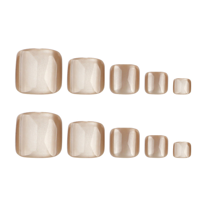 Artful nail art with glitter accents and soft ombre effect Bowlift
