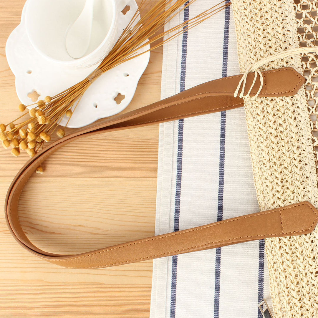 Handbag Made from Handwoven Natural Material with Elegant Tassel Details Bowlift