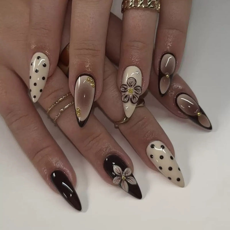 Creative artificial nails with elegant 3D flower accents Bowlift