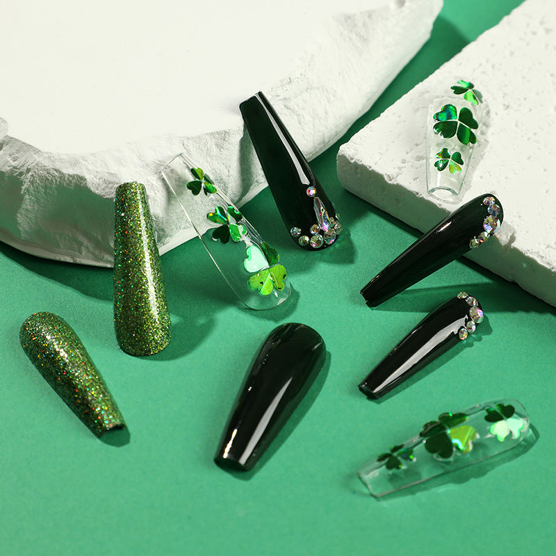 Artificial nail art with clover leaf motifs Bowlift