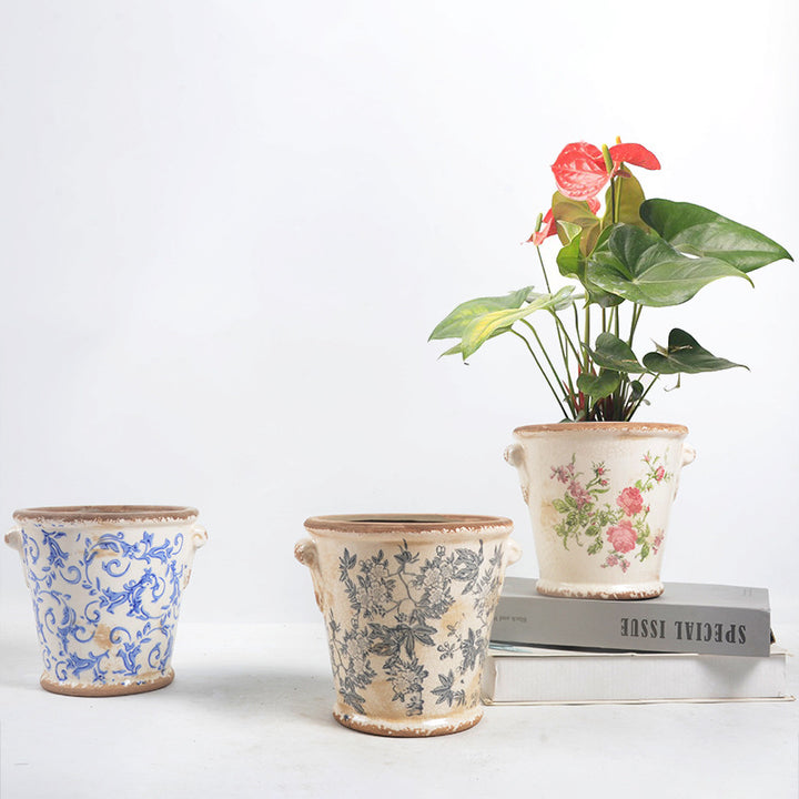 Decorative flower pot with floral embellishments Bowlift