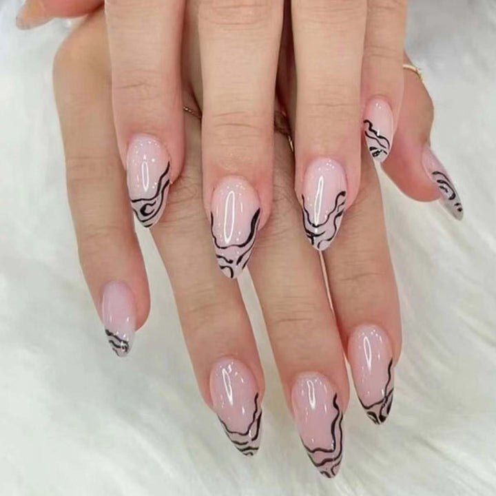 Artful stiletto nails with modern line patterns Bowlift