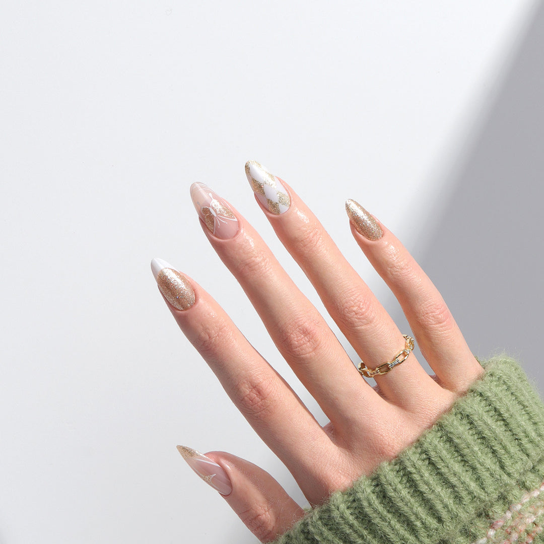 Glamorous Stiletto Press-On Nails with Glitter and Decorative Accents Bowlift