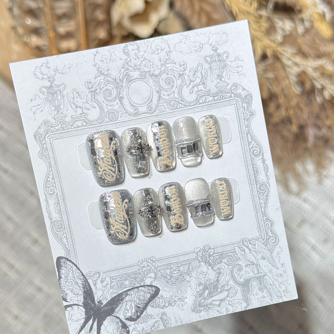 Metallic Press-On Nail Set with Decorative Silver Accents Bowlift