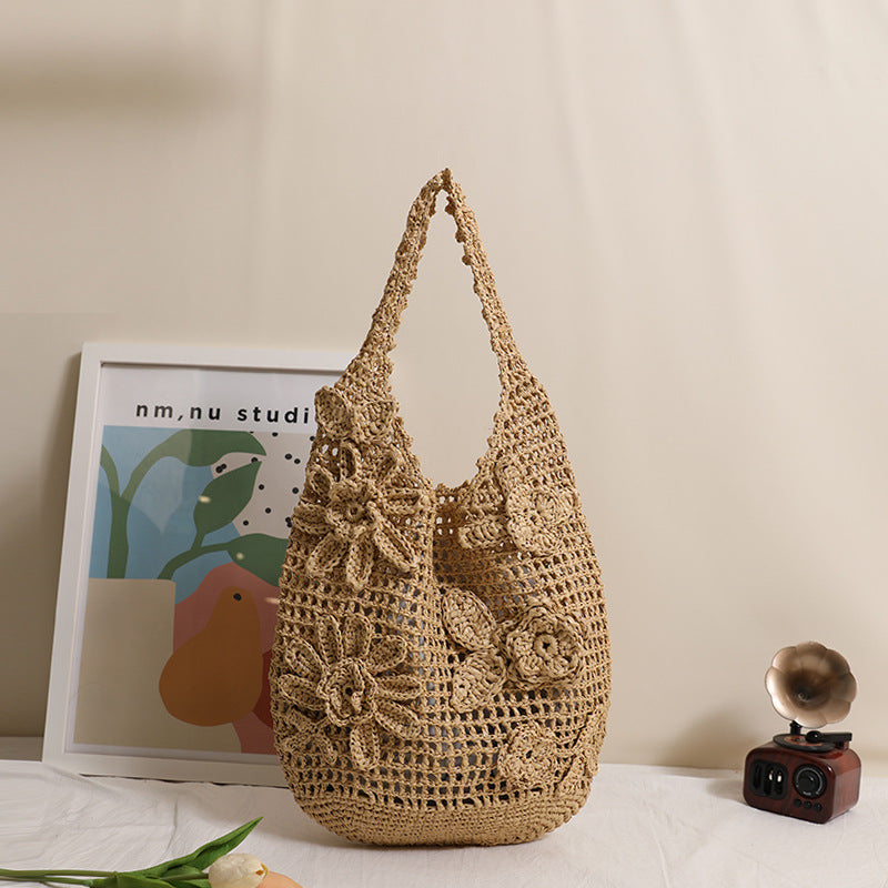 Crocheted shoulder bag with floral appliqués Bowlift