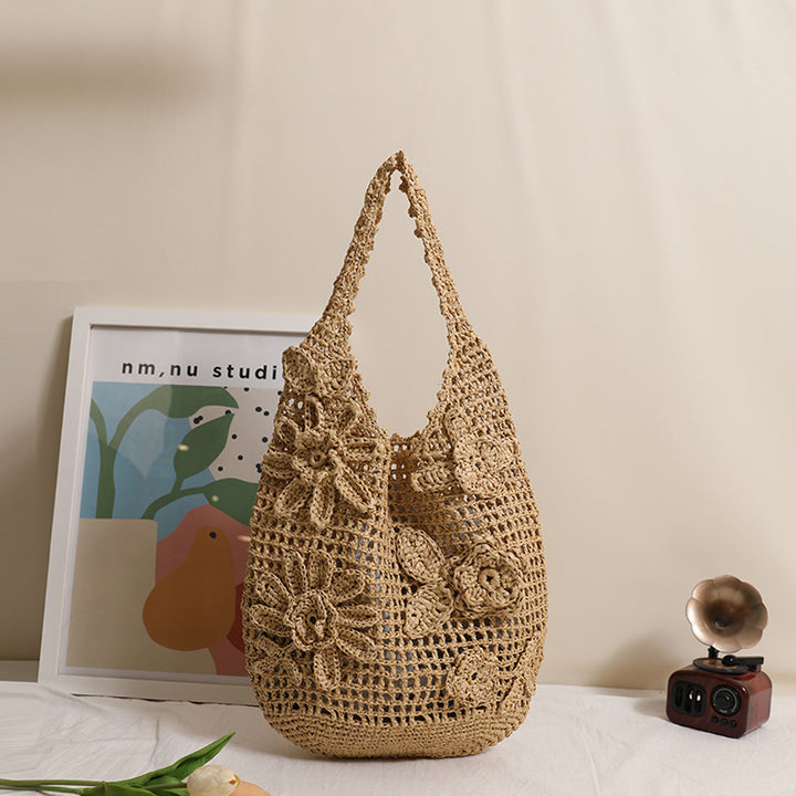 Crocheted shoulder bag with floral appliqués Bowlift