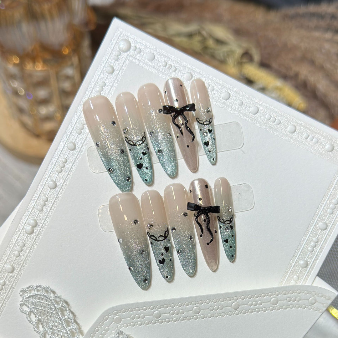 Elegant Stiletto Press-On Nail Set with Rhinestone and Bow Accents Bowlift