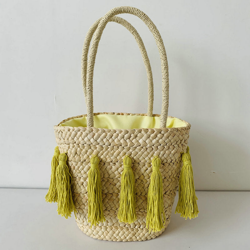 Trendy basket bag with tassels Bowlift