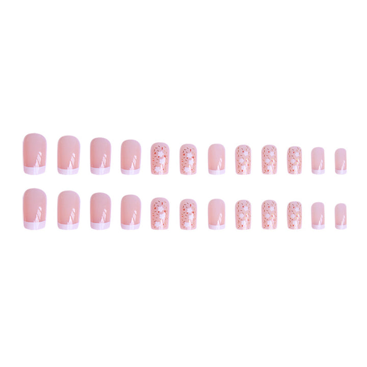 Nail art set with floral decorations and elegant French design Bowlift
