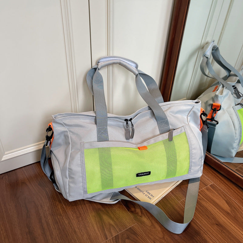 Sporty travel bag with mesh structure and practical compartments Bowlift