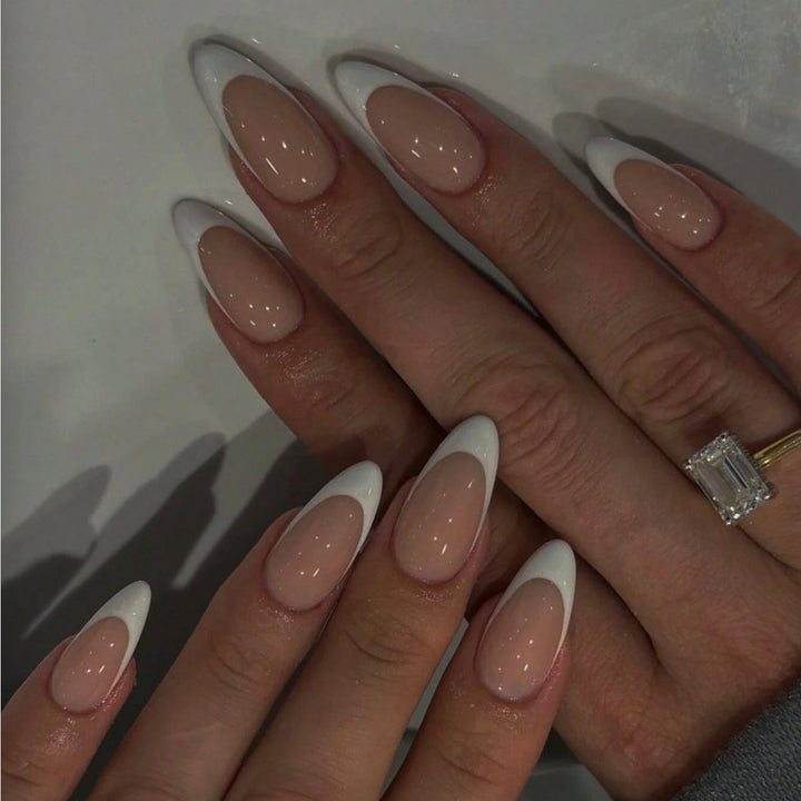 Artificial nail set with elegant French design and trendy accents Bowlift