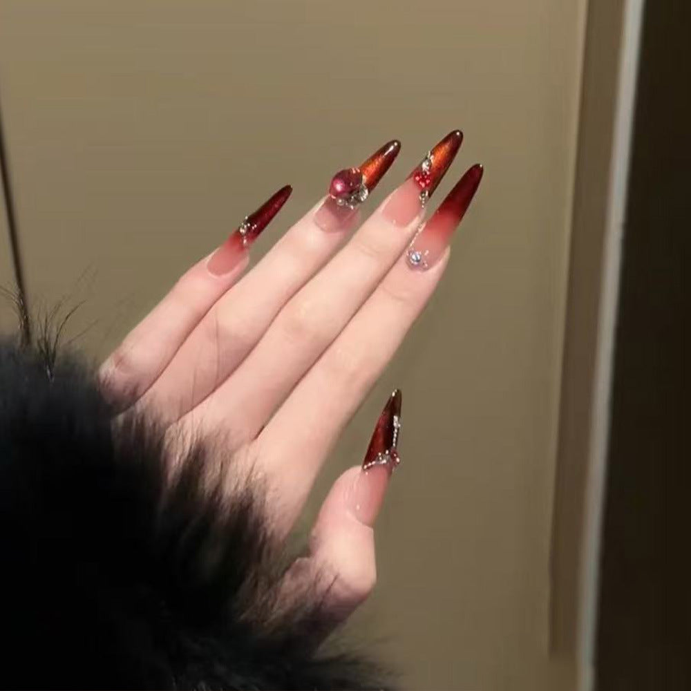 Artificial nails with glamorous rhinestone decorations Bowlift