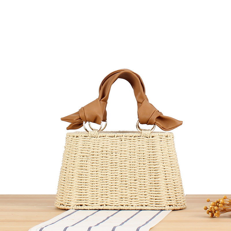 Basket bag with elegant fabric decoration Bowlift
