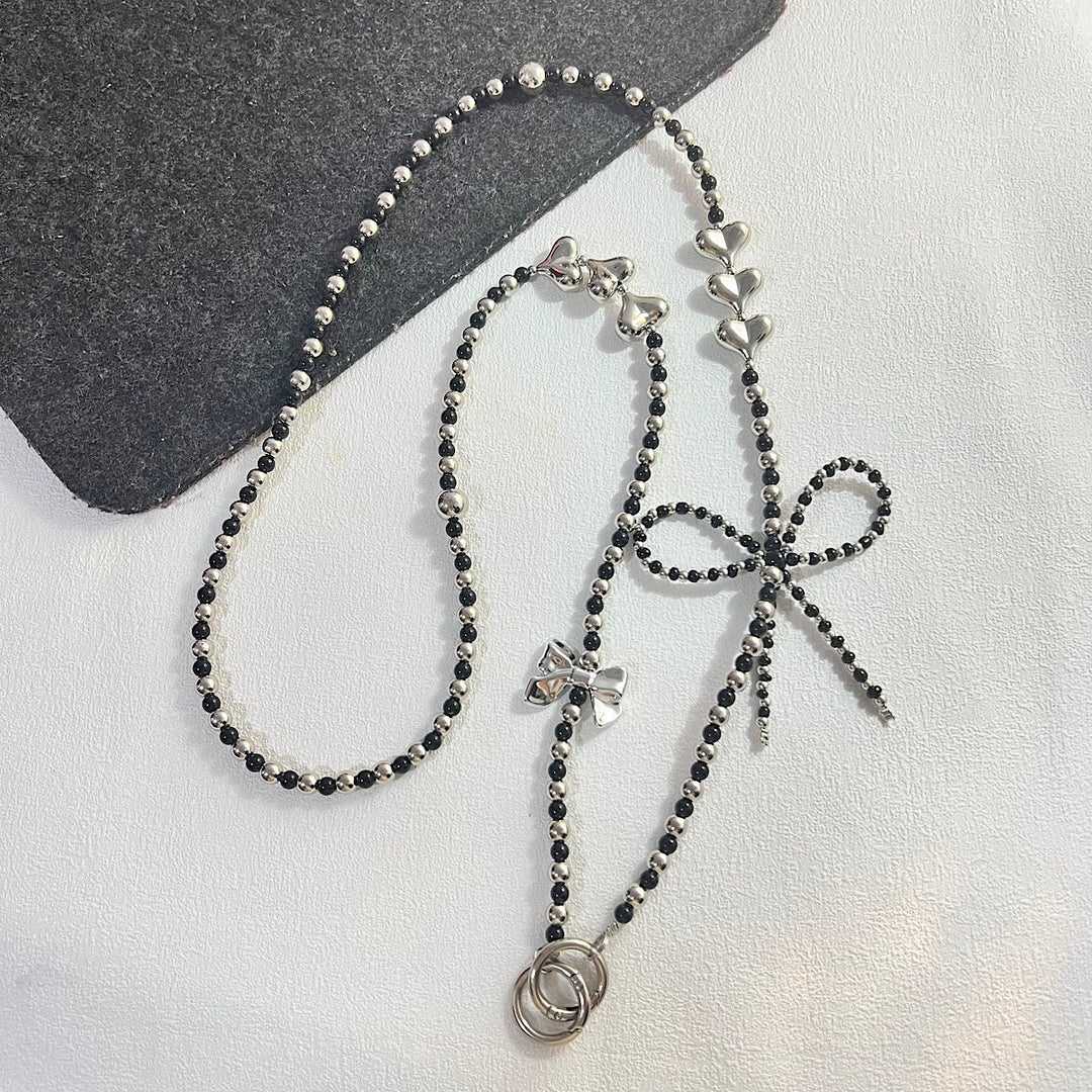 Elegant Pearl and Chain Necklace Bowlift