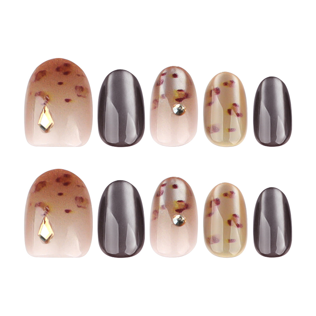 Artistic nail art with glitter accents and elegant design Bowlift