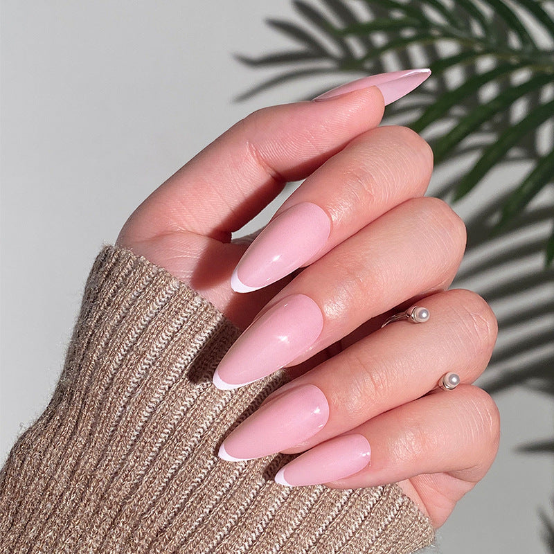 Artistic Stiletto Nails with Elegant French Tip Design Bowlift