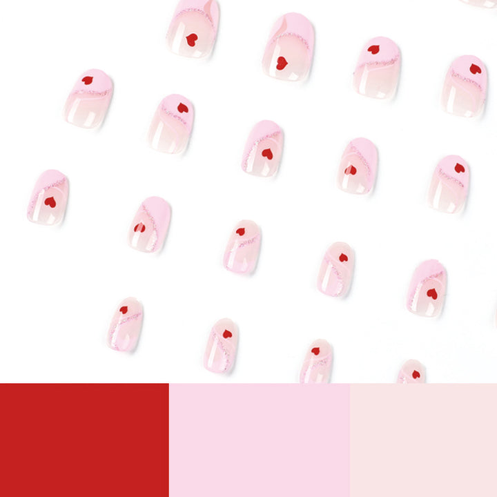 Artistic Nail Extensions with Heart Motif Bowlift