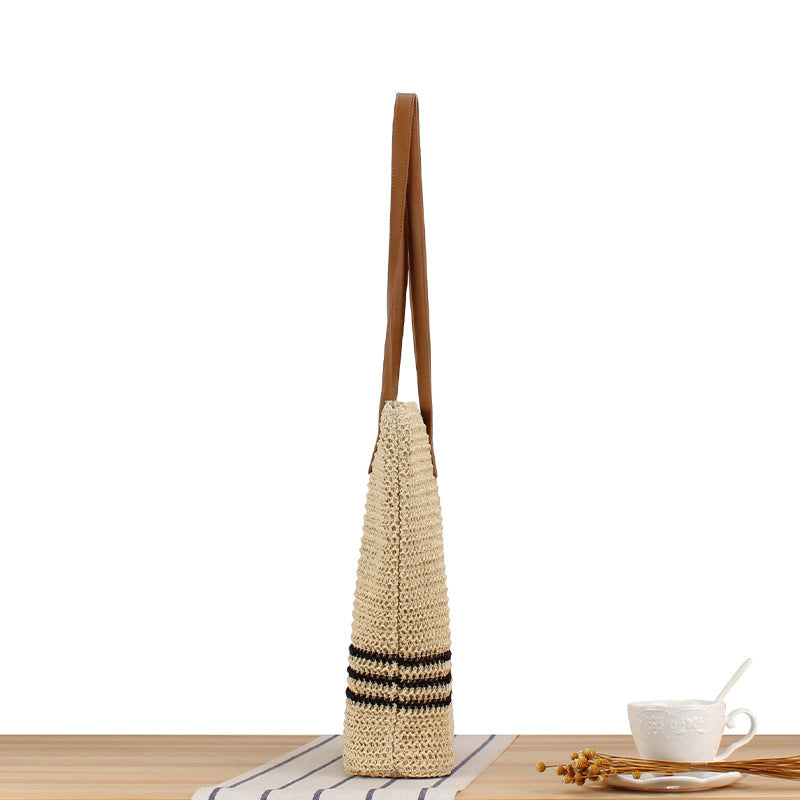Stylish beach bag made of natural weave with leather handles Bowlift